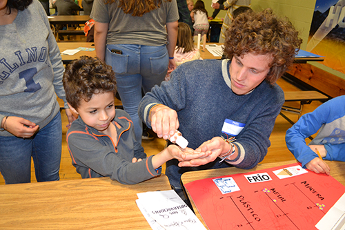 Paul Ruess interacts with a youngster.