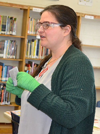 Pamela Pena Martin explains the Destroy-a-Toy activity to Franklin students