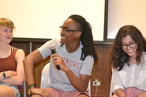 Asim Baraka, who plays Damon in the series, answers a question from the audience during the panel discussion.