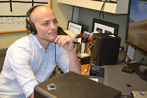 John Isberg doing some post production in his campus office