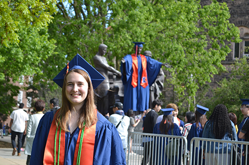 Katie Carroll by Alma Mater during her May 2019 graduation from Aerospace Engineering.