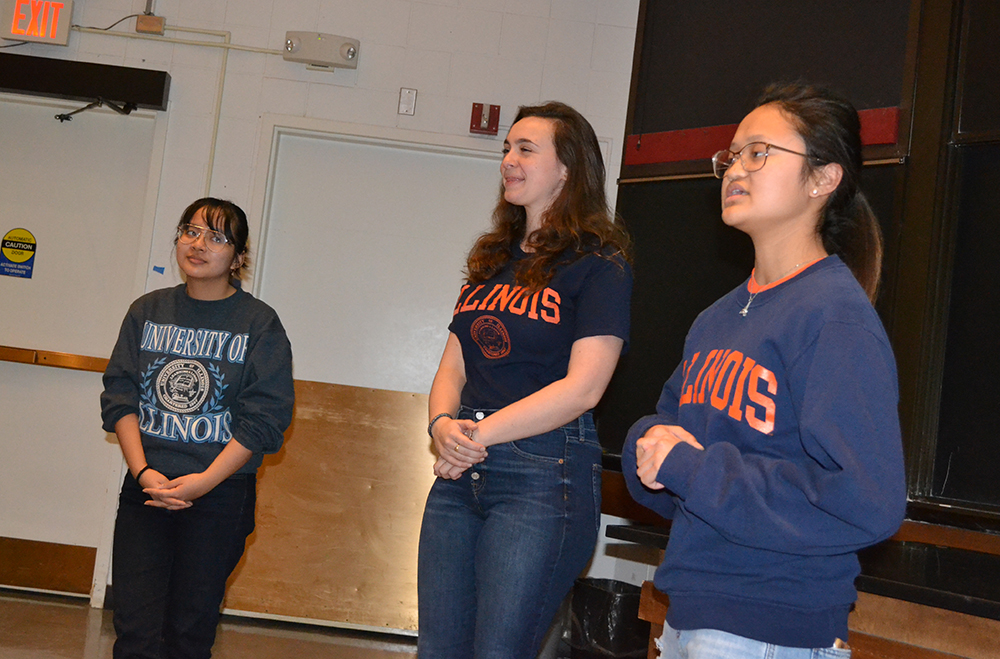 Kelsey Biscocho, Amanda Maher, and Lauren Gil  give a presentation about Alma’s Talking Dogs during the Society of Women Engineer's Engineering Exploration outreach for 40 or so mostly middle school girls on February 22, 2020.