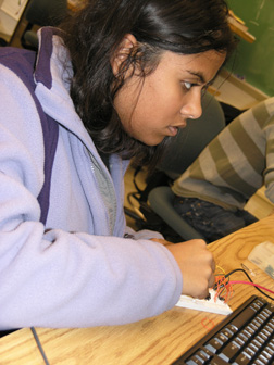 ECE 101 student works on project during class lab.
