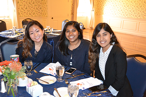 Left to right: Fundraising Committee director Vera Liu, SWE member Isha Tyle, and Outreach Committee Co-chair Simran Vinaik prepare to enjoy the evening at SWE's recent Be Professional event.