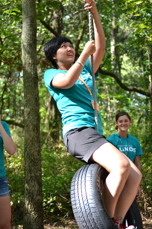 Camper on tire swing station.