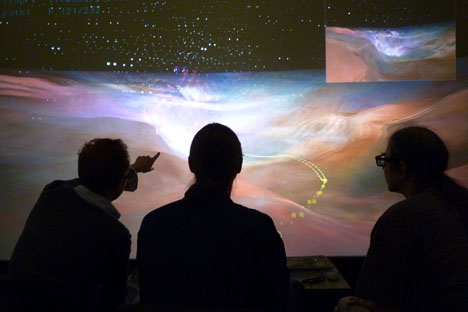 AVL staff works on the Orion Nebula visualization.