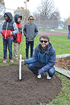 Professor Mattia Gazzola (front center) with the fledgling Swamp White Oak he helped to plant. 