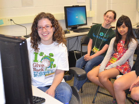 Cassie Wesseln, left, and some campers enjoy graphics created with special imaging software