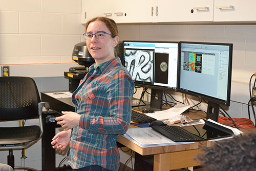 MRL Research Scientist Kathy Walsh interacts with Franklin students while demonstrating how a 3D Optical Profiler works.