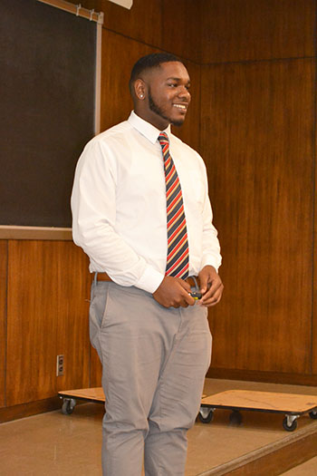 During the August 2nd final presentation, REU participant Michael Glasper answers questions about his research on the preparation and characterization of spin-polarized tips.