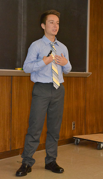 Lucas Komara presents his research during the final session of the I-MRSEC REU on August 2nd.