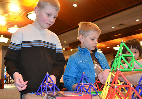 Young visitors create  fractals during  the Winter Math Carnival.