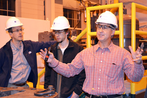 Instructor Jeff Roessler (left) a CEE 398 student, and Abbott Power Plant Engineer during a site visit to the power plant