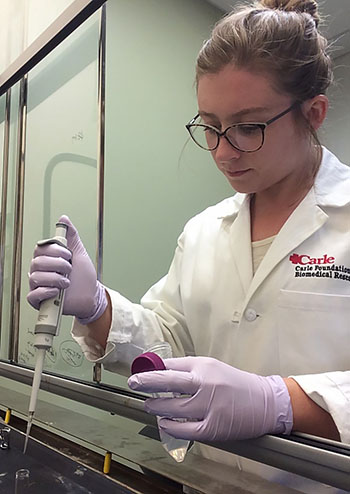 2015 researcHStart participant, Callie Miller, in the lab at the Mills Breast Cancer Institute at Carle Clinic. (Photo courtesy of the Cancer Center at Illinois