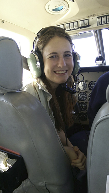 Katie Carroll prepares to pilot a small prop plane during G.A.M.E.S. camp in the summer of 2014. (Photo courtesy of Katie Carroll.)