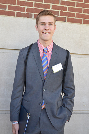 Industrial Engineering junior Charles Wennerstrum waits in line to chat with some company representatives during ECF.