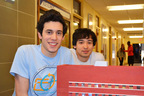 Gillermo Acevedo and Thomas Navidi by the model of the new ECE building they built for EOH 2014.