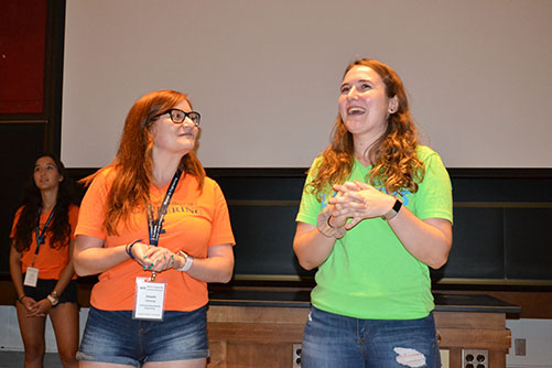 Katie Carroll (right) back on campus for Women in Engineering Orientation in fall 2019, where she helped introduce a video she helped make about women in engineering during her senior year at Illinois.