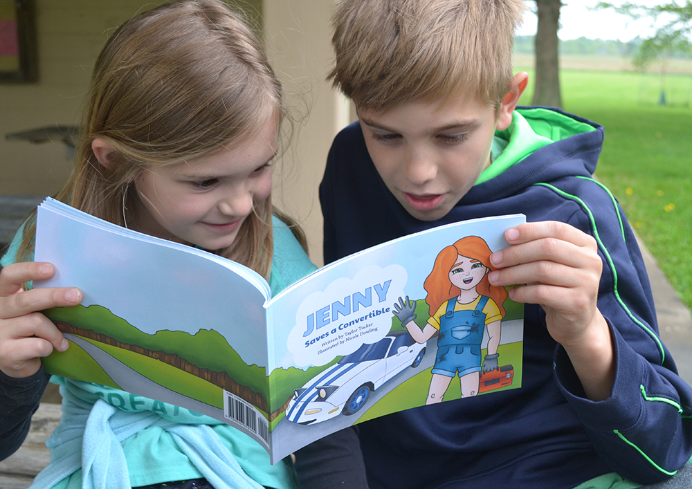 Kids reading Jenny Saves a Convertible