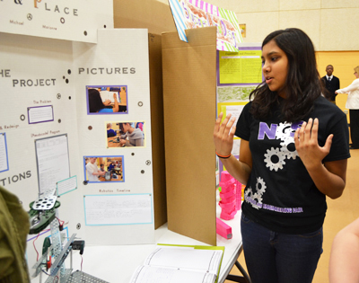 Next Gen middle school student discusses her robotics project, entitled 