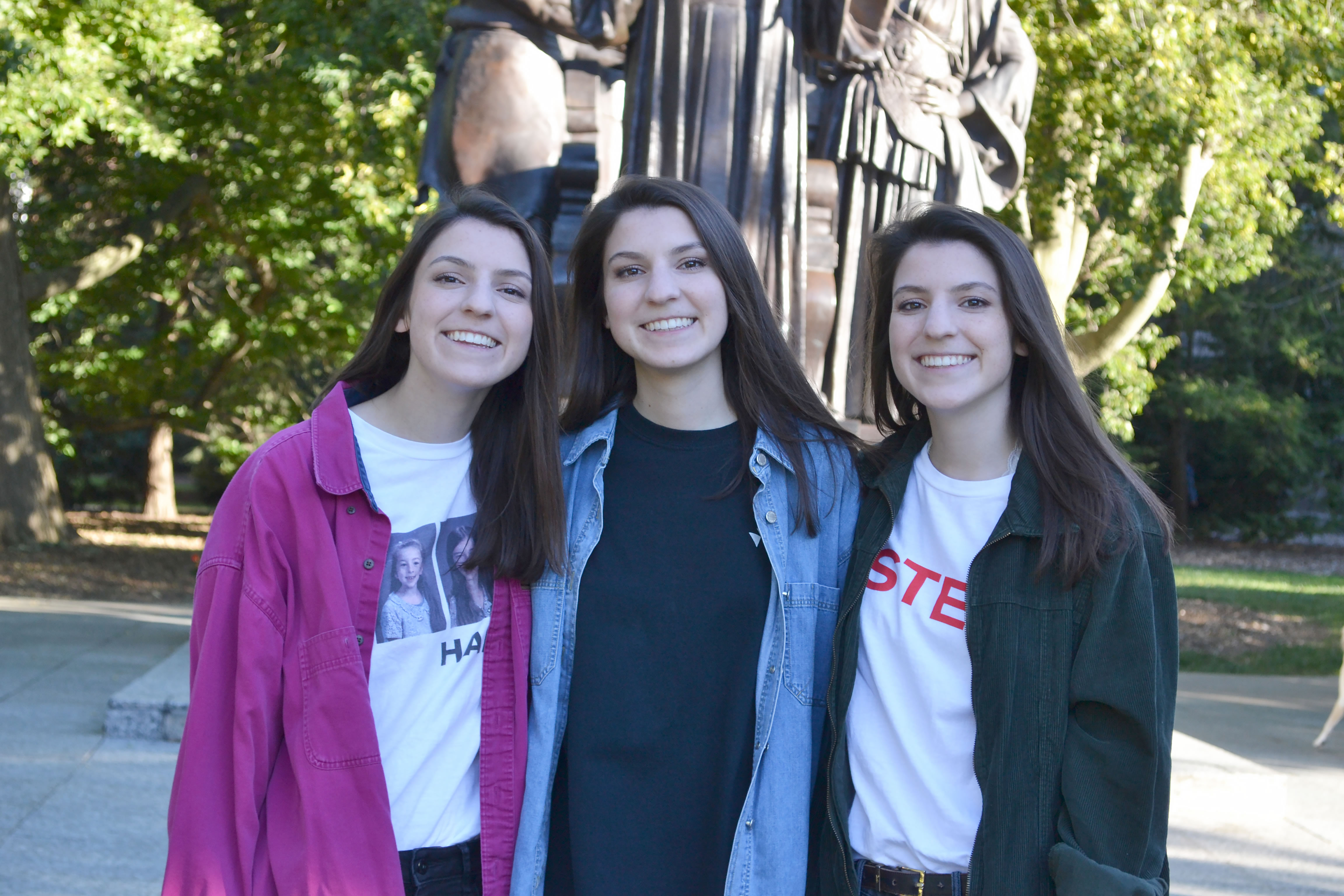 (left to right) Theresa, Frances, and Mary Ponicki in front of the Alma Mater.