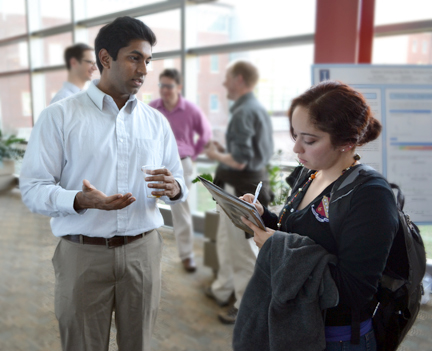 RAM, a member of CEE 398 PBL course explains how the course is going so far to I-STEM undergrad student Katie Villa-Gomez.