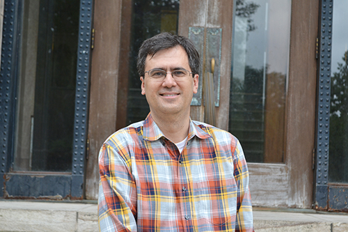 Mathematics Department Chair, Jeremy Tyson, in front of the mathematics building.