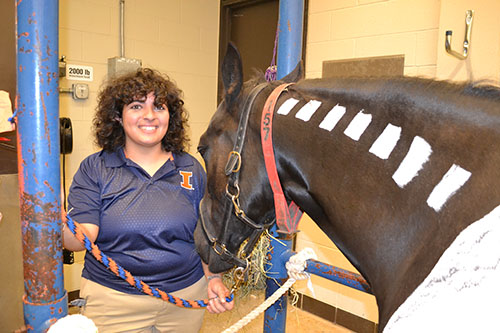 Vet Med student Nina Shahidi with Lucy the horse.