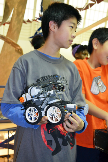 Competitor waits his turn during the recent practice competition held by iRobotics.