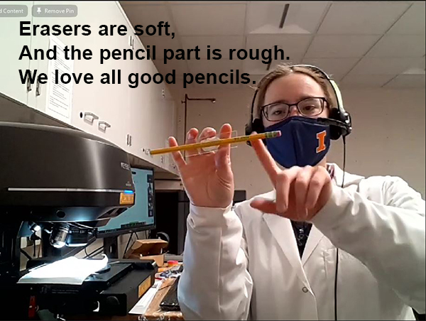MRL scientist Kathy Walsh discusses a pencil she's going to analyze under the 3D optical profiler. The Haiku was written by Franklin seventh grader Evelyn O'Brien.