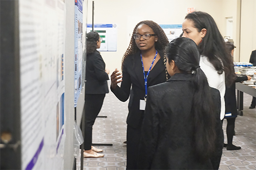 Kerene Kombe discusses her research at ERN. (Image courtesy of Joe Muskin)